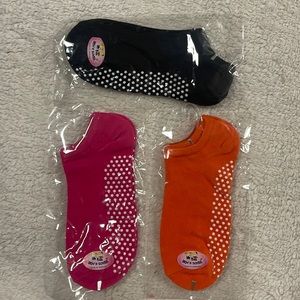 Grip socks.  Three (3) pairs Black, orange and pink new, brand is bens’s …